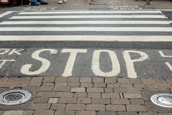Picture of a crosswalk in Galway, Ireland with the BIG word STOP. Stop Doing These Seven Things In Training